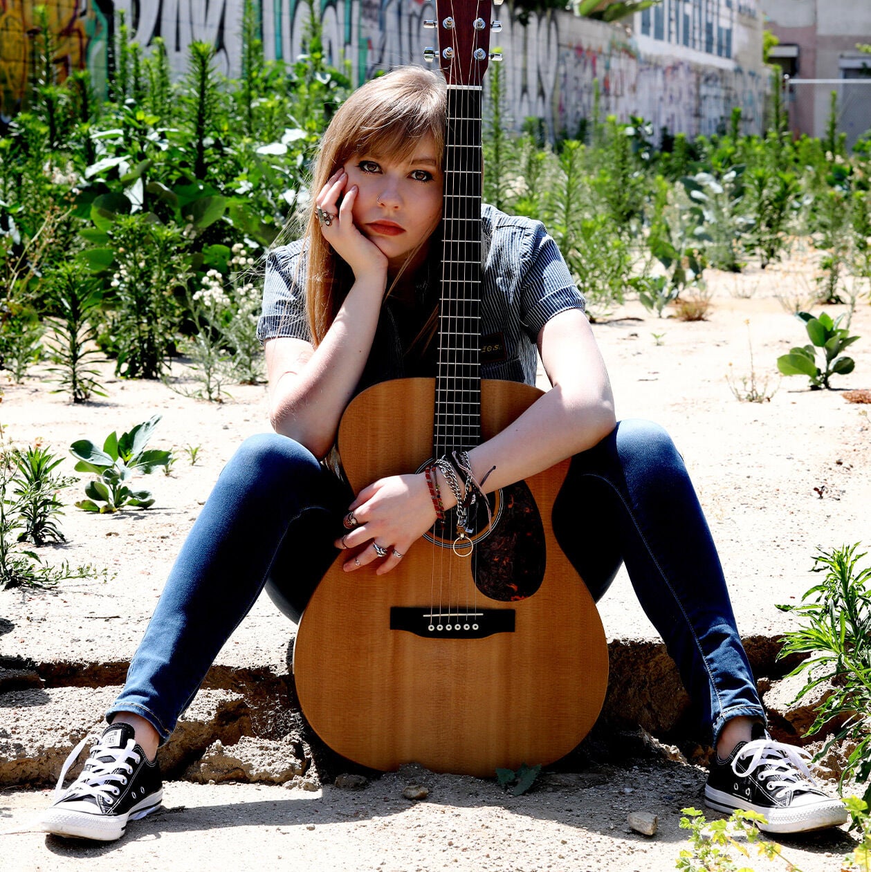 Abigail Fierce and her acoustic guitar